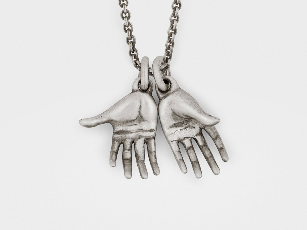 SNAKE BONES Hands Pendant in Sterling Silver